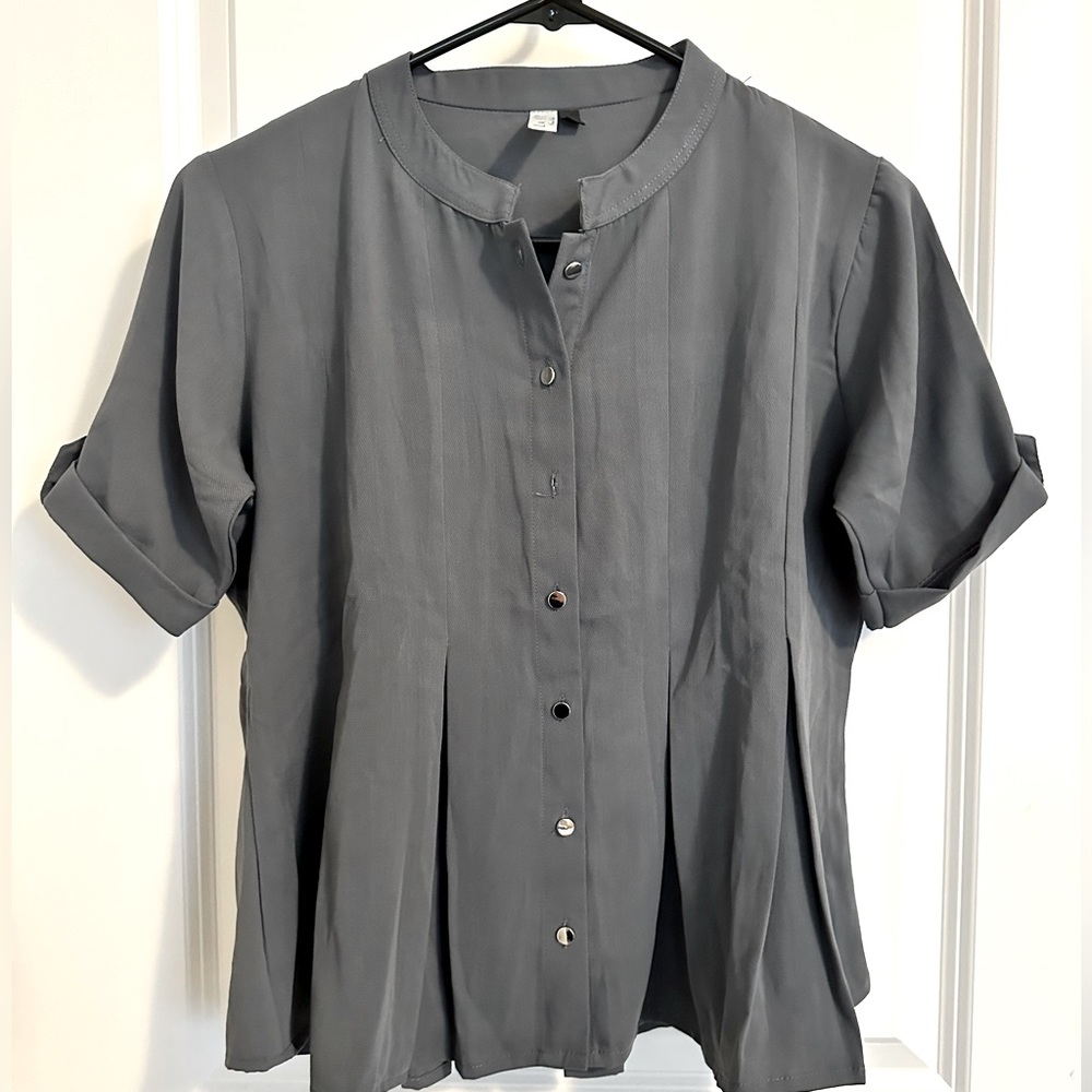 Casual buttoned down peplum top